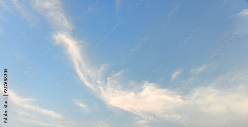 Vast Expanses of Cerulean Sky Adorned with Wisps of Delicate White Clouds, Stretched Like Gentle Strokes Across the Canvas of the Horizon, Creating a Serene and Dreamy Atmosphere in the Early Evening Vast Expanses of Cerulean Sky Adorned with Wisps of Delicate White Clouds, Stretched Like Gentle Strokes Across the Canvas of the Horizon, Creating a Serene and Dreamy Atmosphere in the Early Evening