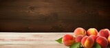 Table with fresh flat peaches featuring a banner design and ample copy space for text
