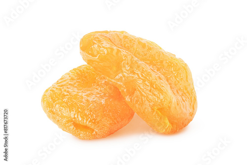 Two dried apricots segments isolated on white background