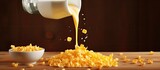 A bowl of corn flakes with milk creating a breakfast meal. Creative banner. Copyspace image