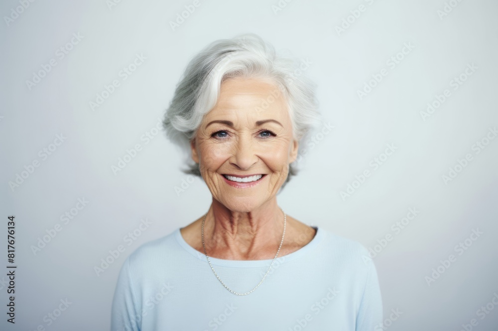 senior businesswoman smiling on white background senior businesswoman smiling on white background
