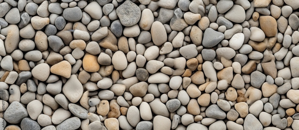 Texture of aggregate concrete with brown pebbles on a background providing ample copy space image Texture of aggregate concrete with brown pebbles on a background providing ample copy space image