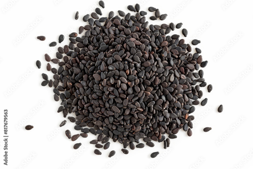 Black organic sesame seeds on white background top view Black organic sesame seeds on white background top view