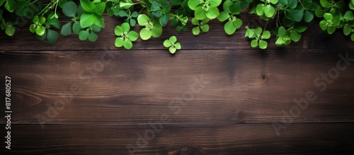 A St Patrick s Day celebration with a copy space image featuring a flat lay composition of clover leaves on a wooden table