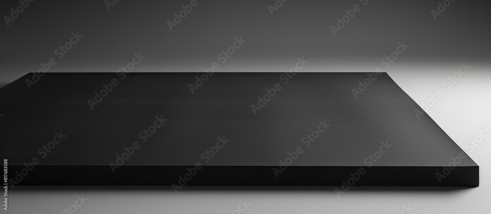 Copy space image of black paper against a white backdrop