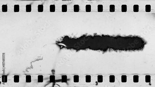 Damaged an old celluloid film strip with dust and scratches