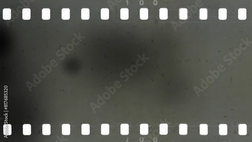 Damaged an old celluloid film strip with dust and scratches