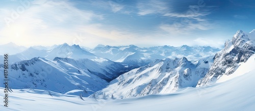 A breathtaking snowy landscape with majestic mountains in the wintertime providing a picturesque and serene copy space image © HN Works