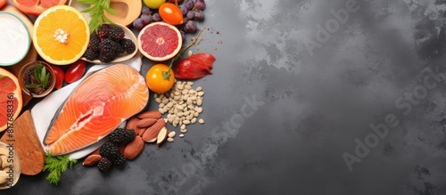 Top view of a marble background with a variety of protein rich natural food items leaving ample space for text photo