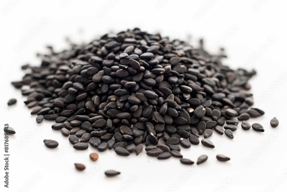 Black sesame seeds close up on white background Black sesame seeds close up on white background