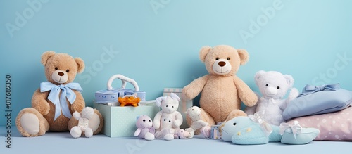 Copy space image featuring a variety of baby accessories placed on a light blue background providing room for adding text © HN Works