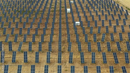Wallpaper Mural Aerial view of a a large field of solar panels. The panels are arranged in rows and are spread out across the field. Scene is one of efficiency and sustainability Navarre, Spain. Europe. Torontodigital.ca
