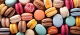 Colorful background showcasing a delectable assortment of French macarons in a captivating copy space image