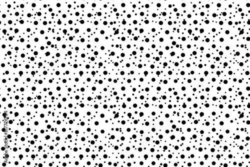 A black and white image of a pattern of dots