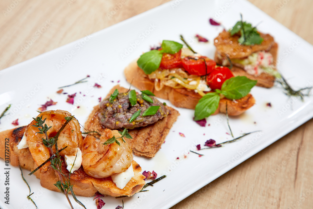 bruschetta with different vegetables and meat bruschetta with different vegetables and meat