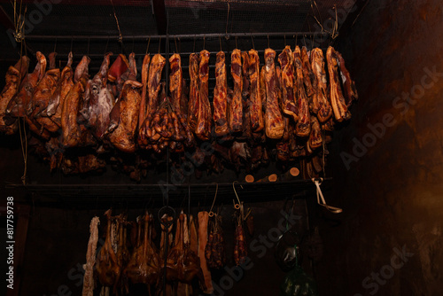 perserved pork and sausage hanging on shelf photo