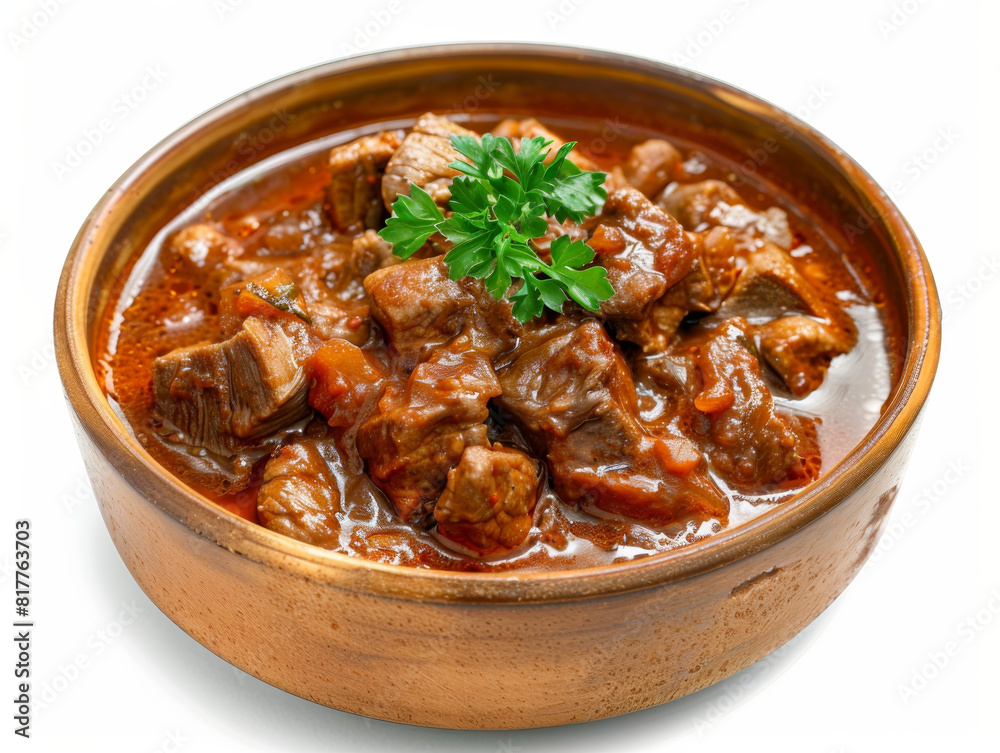 A bowl of stew with meat and parsley A bowl of stew with meat and parsley