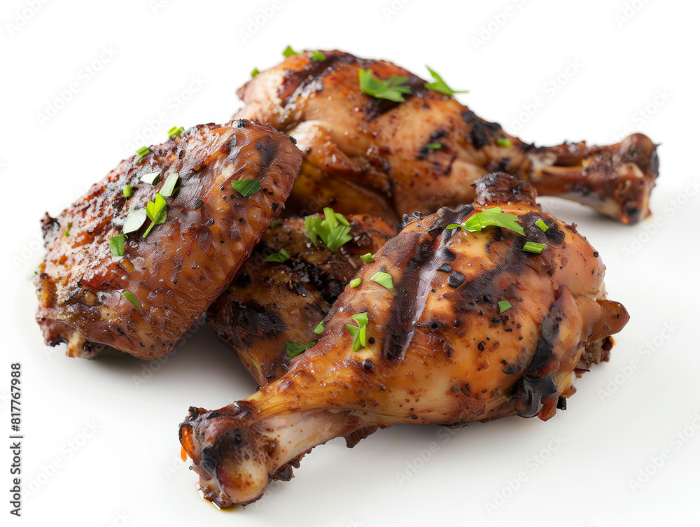 Three pieces of grilled chicken with parsley on top