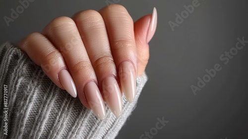 Female hands with beige nail design. Brown manicure with varnish photo