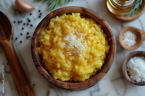 Risotto alla Milanese: Creamy saffron-infused risotto with a bright yellow color and a slightly glossy finish. -