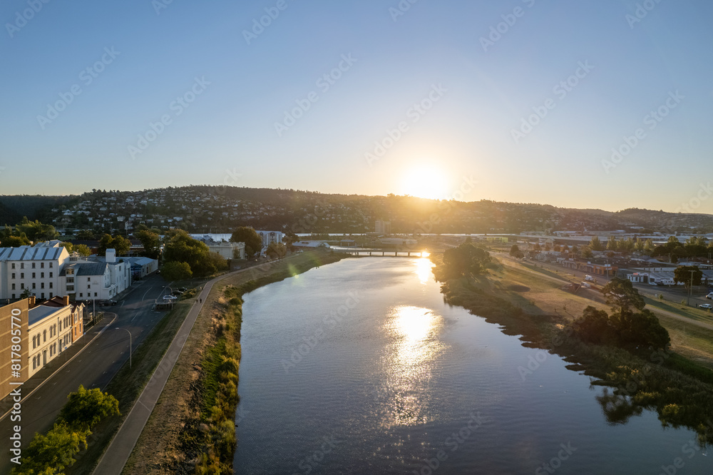 Aerial photo looking out over Launceston above the North Esk River at sunset with blue sky Aerial photo looking out over Launceston above the North Esk River at sunset with blue sky