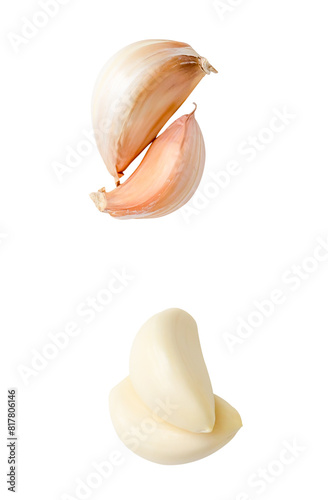Top view set of fresh peeled and unpeeled garlic cloves in stack isolated on white background with clipping path
