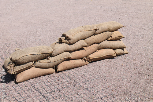 A Pile of Sand Filled Hessian Sack Sandbags.