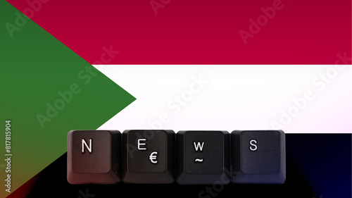 Sudan technology news concept, News text created with keyboard with Sudan flag, streamer headline