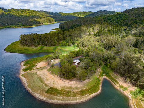 Aerial of beautiful Lake Baroon Pocket Dam with mounatins and forests in the background photo