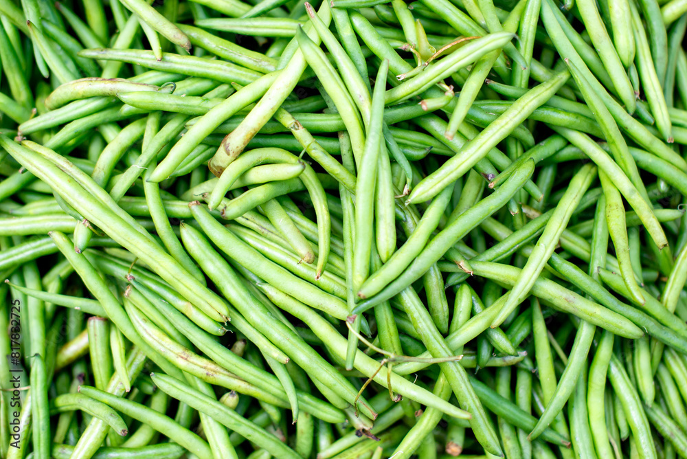 the green beans are piled together on the table closeup the green beans are piled together on the table closeup