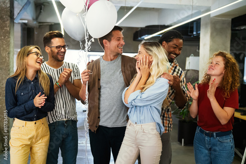 Slika na platnu Friendly diverse employees congratulating businesswoman with business achievemen