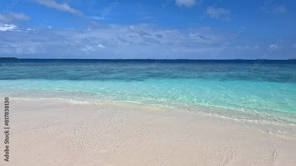 View from the beach to tropical island with building. Maldives. View from the beach to tropical island with building. Maldives.