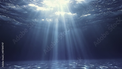 Deep Ocean Background with Sunlight Filtering Through Water photo