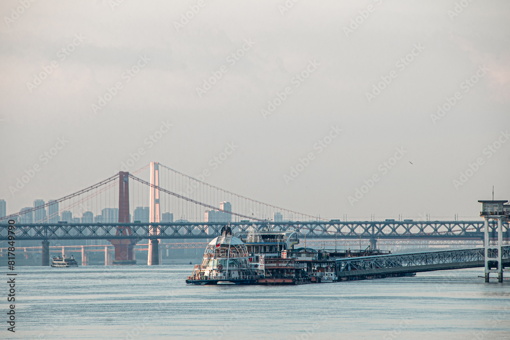 Early morning view of bridges and ships on the Yangtze River. Early morning view of bridges and ships on the Yangtze River.