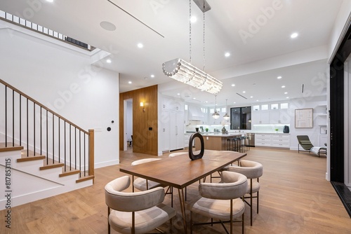 a large dining table with chairs in the middle of the room