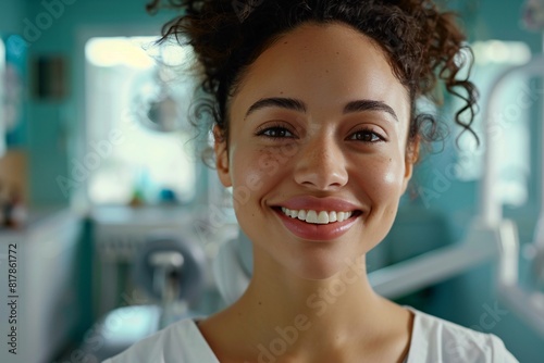  Young woman with a bright  confident smile  showcasing healthy teeth and gums in a dental office setting