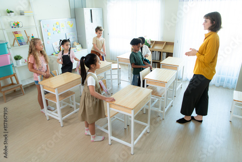 Teacher and students, In the morning to begin learning and studying in a classroom of school.