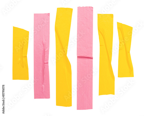 Top view set of wrinkled yellow and pink adhesive vinyl tape or cloth tape in stripes shape isolated on white background with clipping path