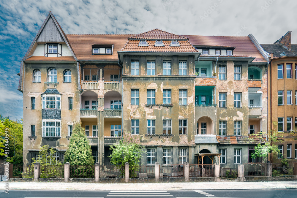 Fototapeta premium Old neglected tenement houses. Urban architecture.