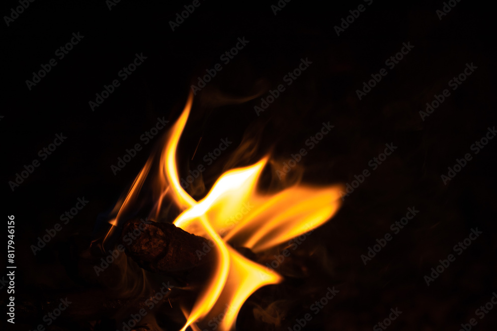 Fire texture on a black background. The fire pattern at night has its own impression. Fire texture on a black background. The fire pattern at night has its own impression.