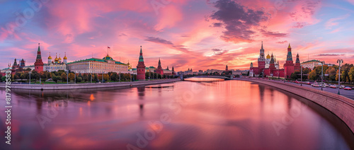 panoramic view of Moscow city, embankment with bridge and the Kremlin at sunset.