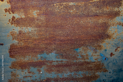 Rust on a metal blue panel for a grunge background and texture