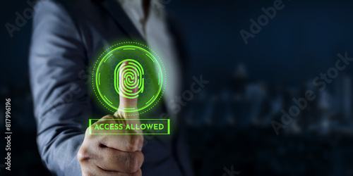 Biometric security system Man uses thumb to access data, Access permission system on screen cyber security innovation technology
