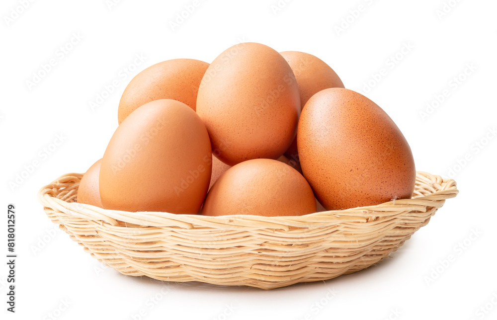 Front view of brown chicken eggs in stack in wicker basket isolated on white background with clipping path Front view of brown chicken eggs in stack in wicker basket isolated on white background with clipping path