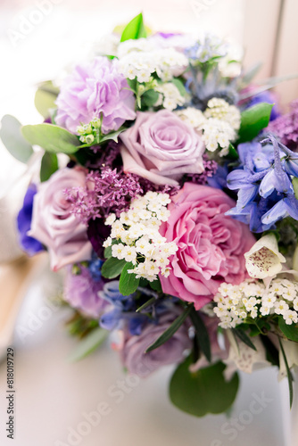 A close-up of a beautiful purple and pink bridal bouquet.  © DPN