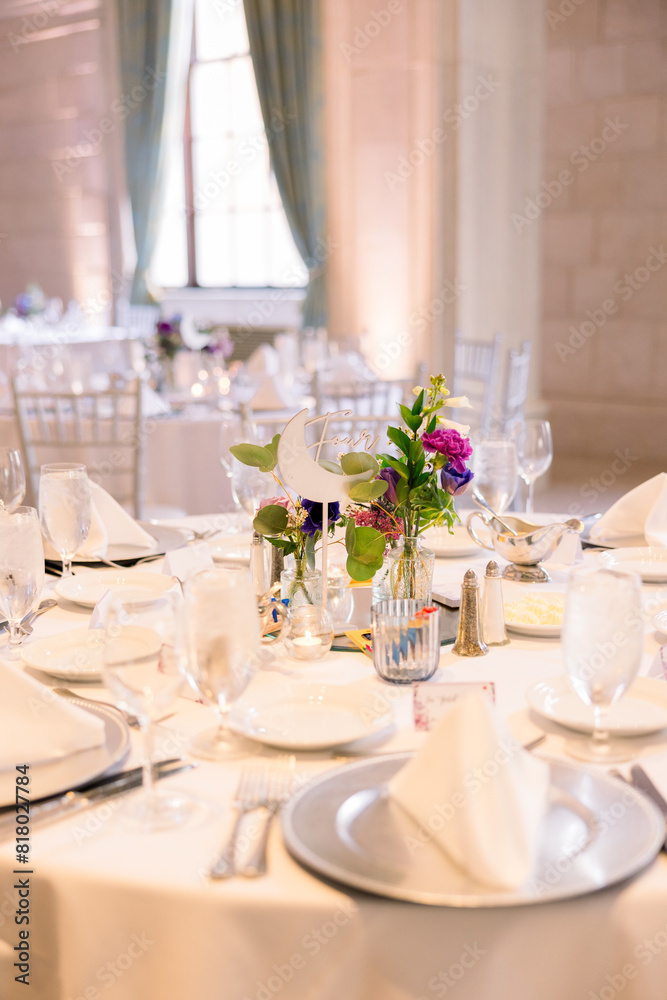 Elegant table setting for a wedding reception.