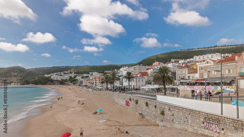 Panorama showing aerial view of Sesimbra Town and seaside timelapse, Portugal. Top landscape with houses and beach from fortress. Castle on the hill. Resort in Setubal district Panorama showing aerial view of Sesimbra Town and seaside timelapse, Portugal. Top landscape with houses and beach from fortress. Castle on the hill. Resort in Setubal district