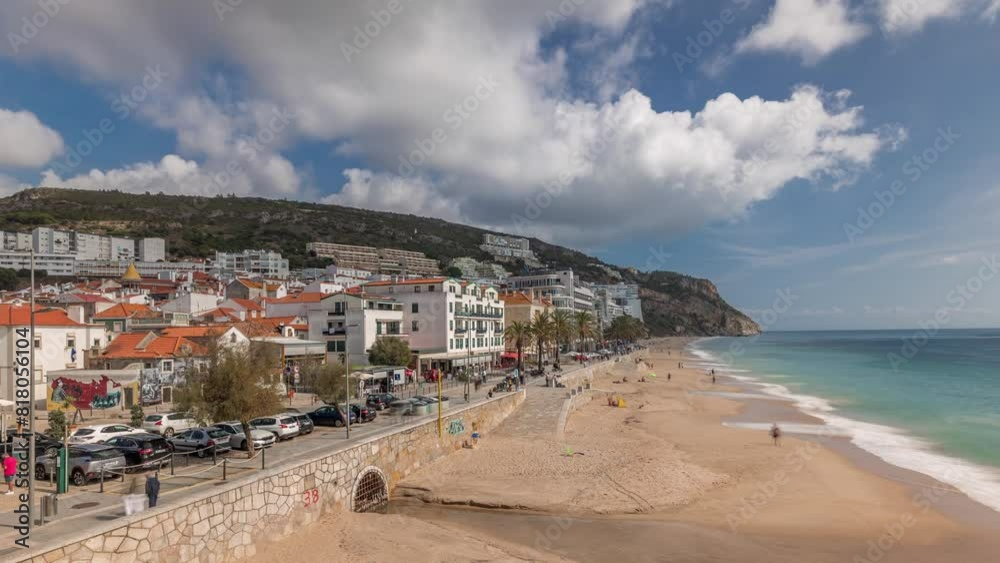 Panorama showing aerial view of Sesimbra Town and seaside walking waterfront timelapse, Portugal. Top landscape with houses and beach from fortress. Resort in Setubal district Panorama showing aerial view of Sesimbra Town and seaside walking waterfront timelapse, Portugal. Top landscape with houses and beach from fortress. Resort in Setubal district