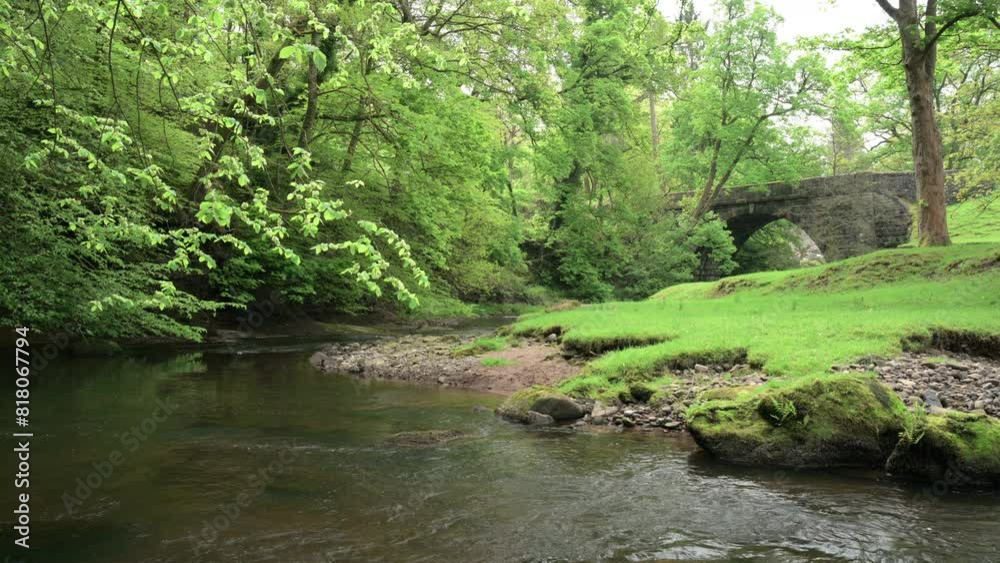 Destination scenic of the River Dane flowing through Danebridge in the Peak District National Park. Destination scenic of the River Dane flowing through Danebridge in the Peak District National Park.