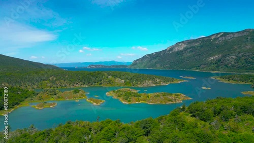 Aerial view of a serene lake surrounded by Patagonian nothofagus trees in Argentina. photo